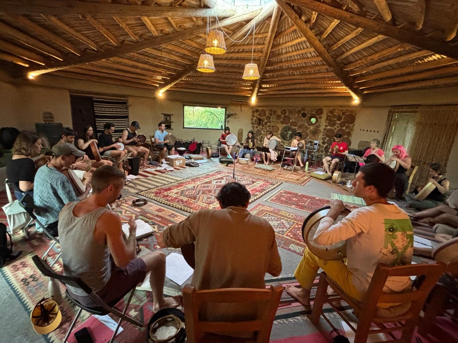 Conservatory students learning together in a circle at the annual in-person seminar