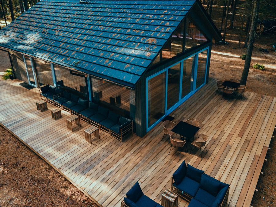 A wooden deck around one of the houses, seen from above