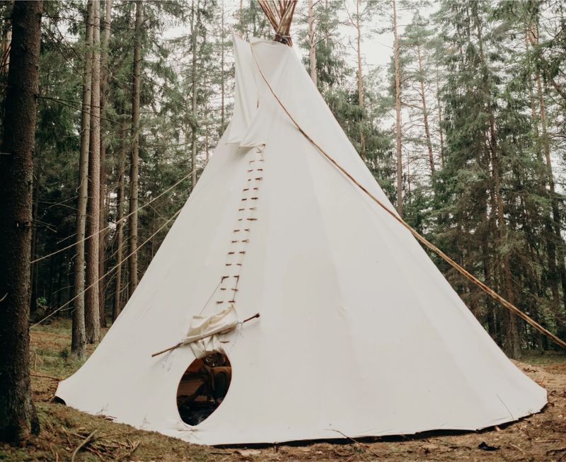 The white tipi in the forest